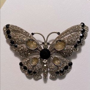 Elegant Silver and Black Butterfly Brooch